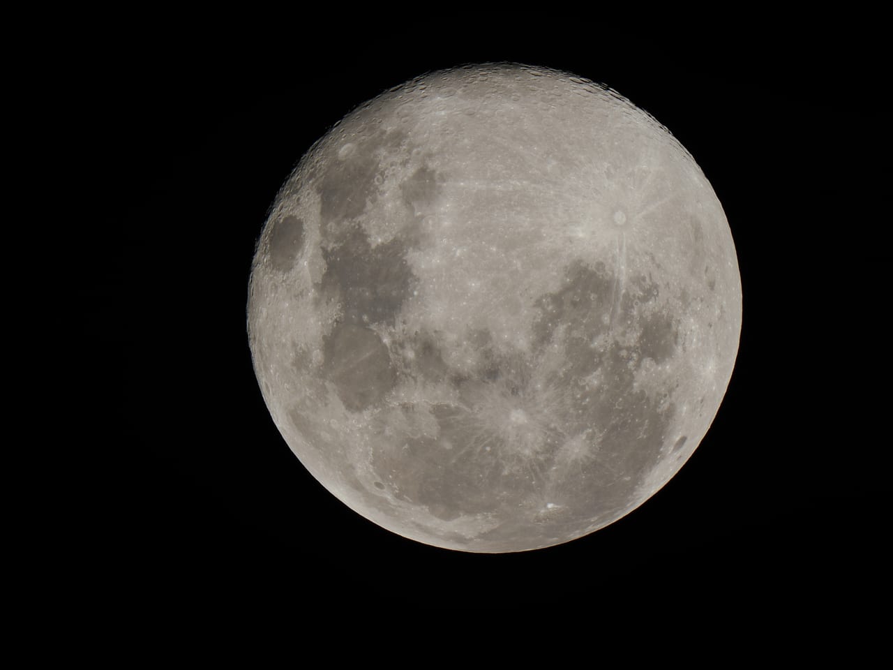 Detailed full moon against a black sky