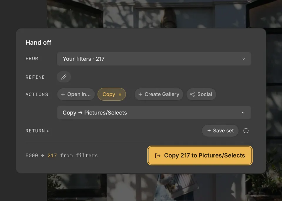 The Handoff card set to copy 217 photos into a new Selects folder.